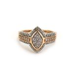 A 9ct rose gold ring set small diamonds in a marquise shaped setting, ring size Q, 3.