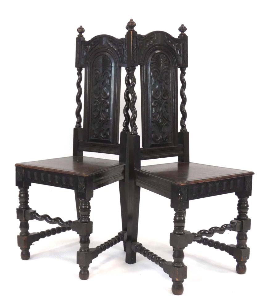 A pair of 17th century style oak side chairs with barley twist sides and supports