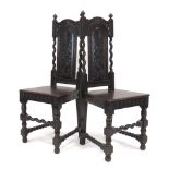 A pair of 17th century style oak side chairs with barley twist sides and supports