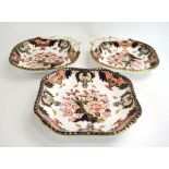 A pair of Royal Crown Derby dishes of shell form, typically decorated in the Imari palette, l.