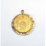 A 9ct yellow gold pendant set a replica Austrian 4 ducat coin, overall 17.