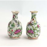 A pair of late 19th/early 20th century Cantonese miniature vases,