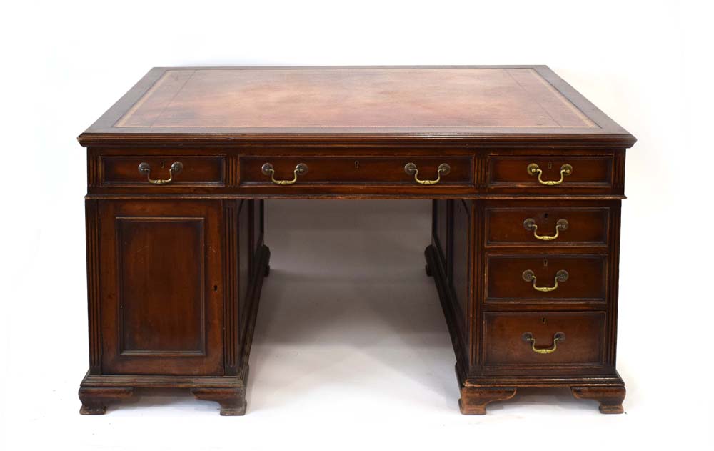 A late 19th/early 20th century mahogany and tooled leather partner's desk on plinth bases, - Image 2 of 3