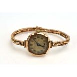 A ladies 9ct yellow gold manual wind wristwatch by James Walker,