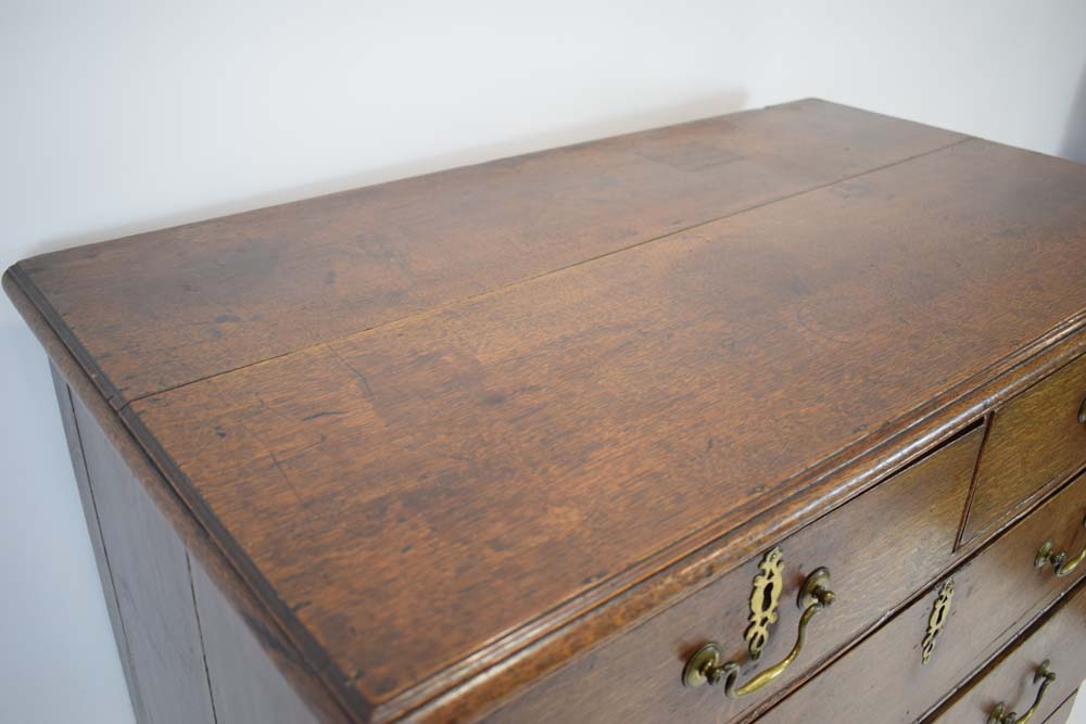 A Georgian oak chest-on-stand, one of the two short drawers with an interior fitted for cutlery, - Image 5 of 5