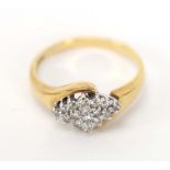 A 9ct yellow gold cluster ring set sixteen small diamonds in a diamond shaped setting, ring size L,