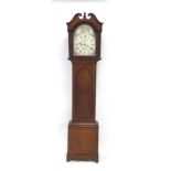 An 18th century and later longcase clock,