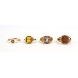 A 9ct yellow gold signet ring and three 9ct yellow gold dress rings, various sizes,