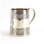 A George III silver Christening mug of typical tapered ribbed form, maker AK, London 1798, h. 7.