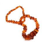 An amber-type graduated rough bead necklace, l.