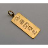 A 9ct yellow gold ingot pendant, London 1976, 9.