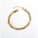 A 9ct yellow gold three bar gatelink bracelet, l. 20 cm, 12.