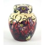 A Moorcroft ginger jar and cover decorated in the Pasque Flower pattern on a cream ground, h.