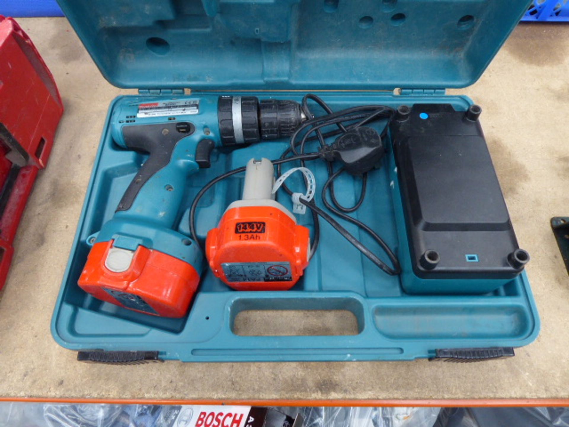 Boxed Makita cordless drill containing 2 batteries and charger