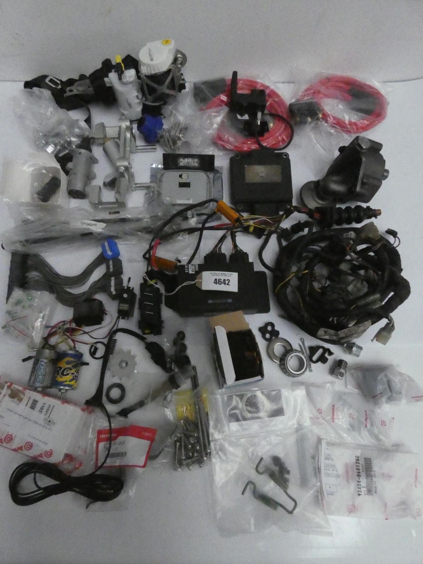 A quantity of automotive parts including a Melling Oil Pump, ECU's, VW Central Locking Module &