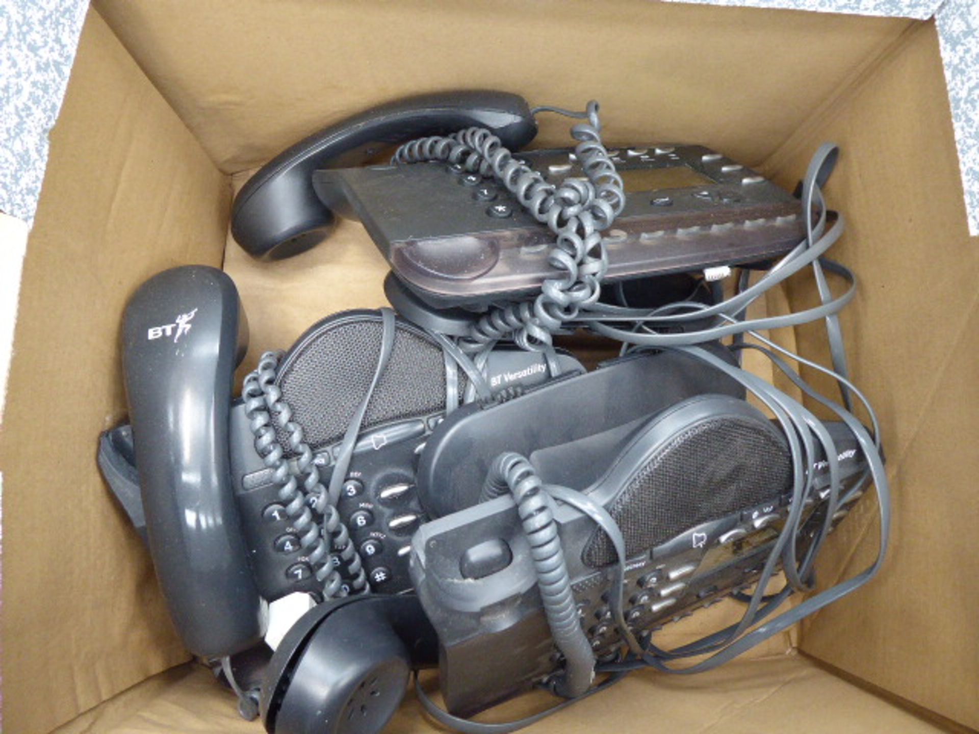 2 boxes of assorted telephone related items and bag of cabling