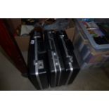 3 black briefcases