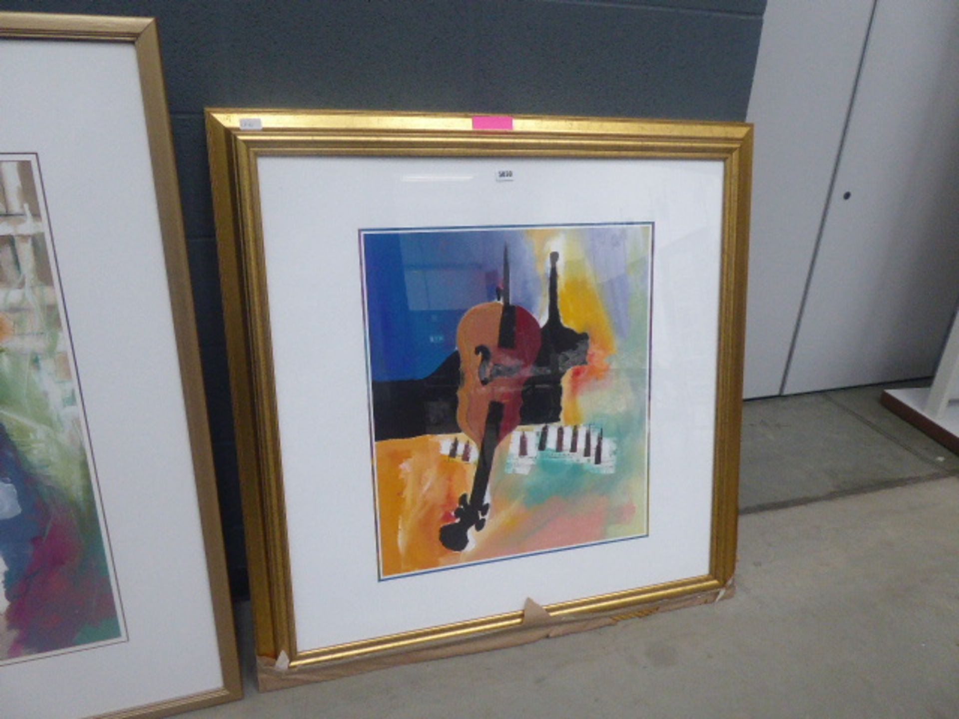 Large framed and glazed print of a stylised violin