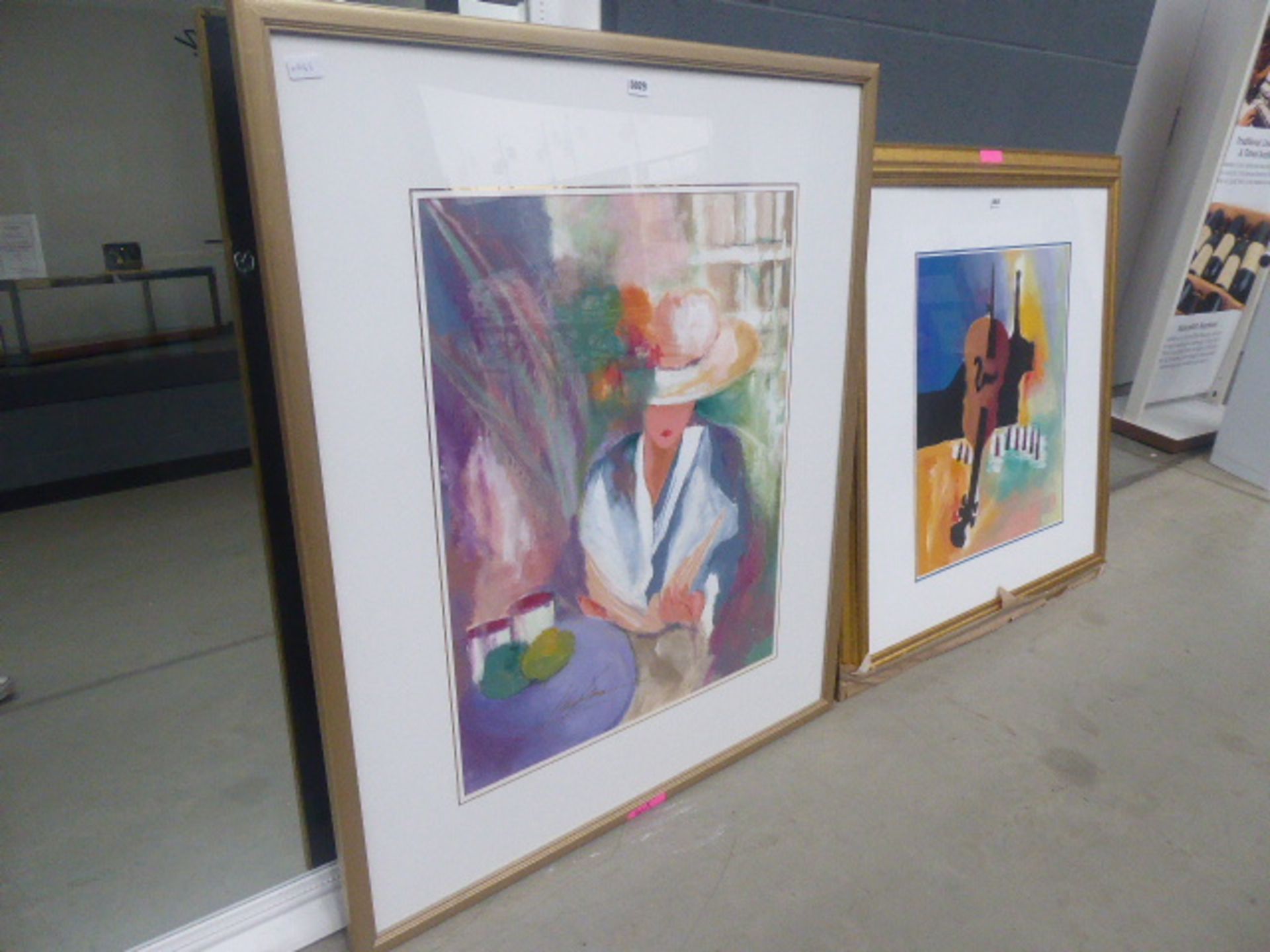 Large framed and glazed print of a female in large hat sitting at a table