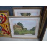 Pair of framed and glazed prints- pond with cottage plus fisherman on river