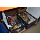 2 boxes containing glassware, a chessboard, beer steins, ornamental cats