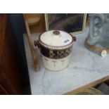 Small biscuit barrel with checker decoration