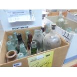 3 boxes containing glass bottles
