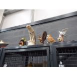 Quantity of ornamental birds and an onyx figure of a hawk