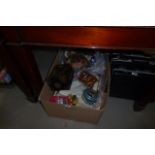 Box containing a chinese jewellery box, a musical box, tins, costume jewellery, placemats and