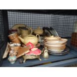 Cage containing pink blush crockery, a brass trivet and figures, scent bottles, a fan and yellow