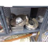 Cage containing baking tins and a jelly mold