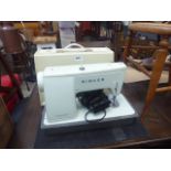 Cased Singer sewing machine