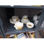 Cage containing a quantity of Royal Doulton parquet patterned crockery