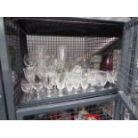 Cage containing glassware