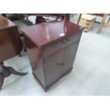 Reproduction mahogany double door cabinet with drawer over