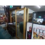 Narrow rectangular bevelled mirror in gilt rope twist frame