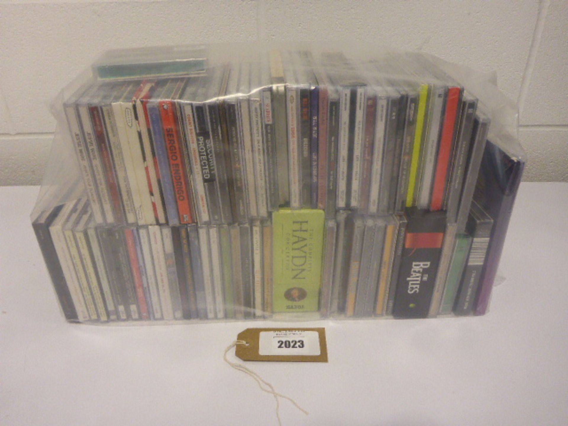 Bag containing 60+ CD's including the Beatles, Shrapnel, Jessie Ware etc.