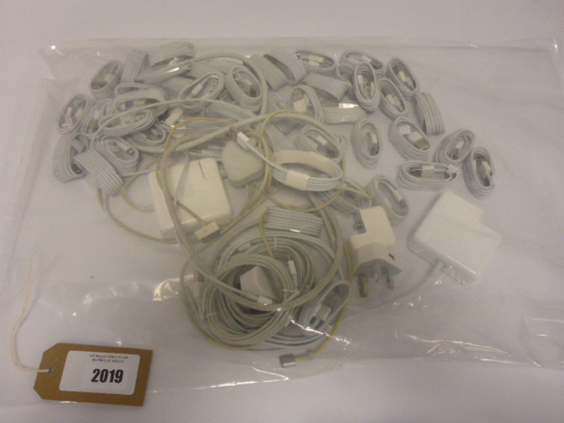 Bag containing replacement Apple device cables , chargers, etc.