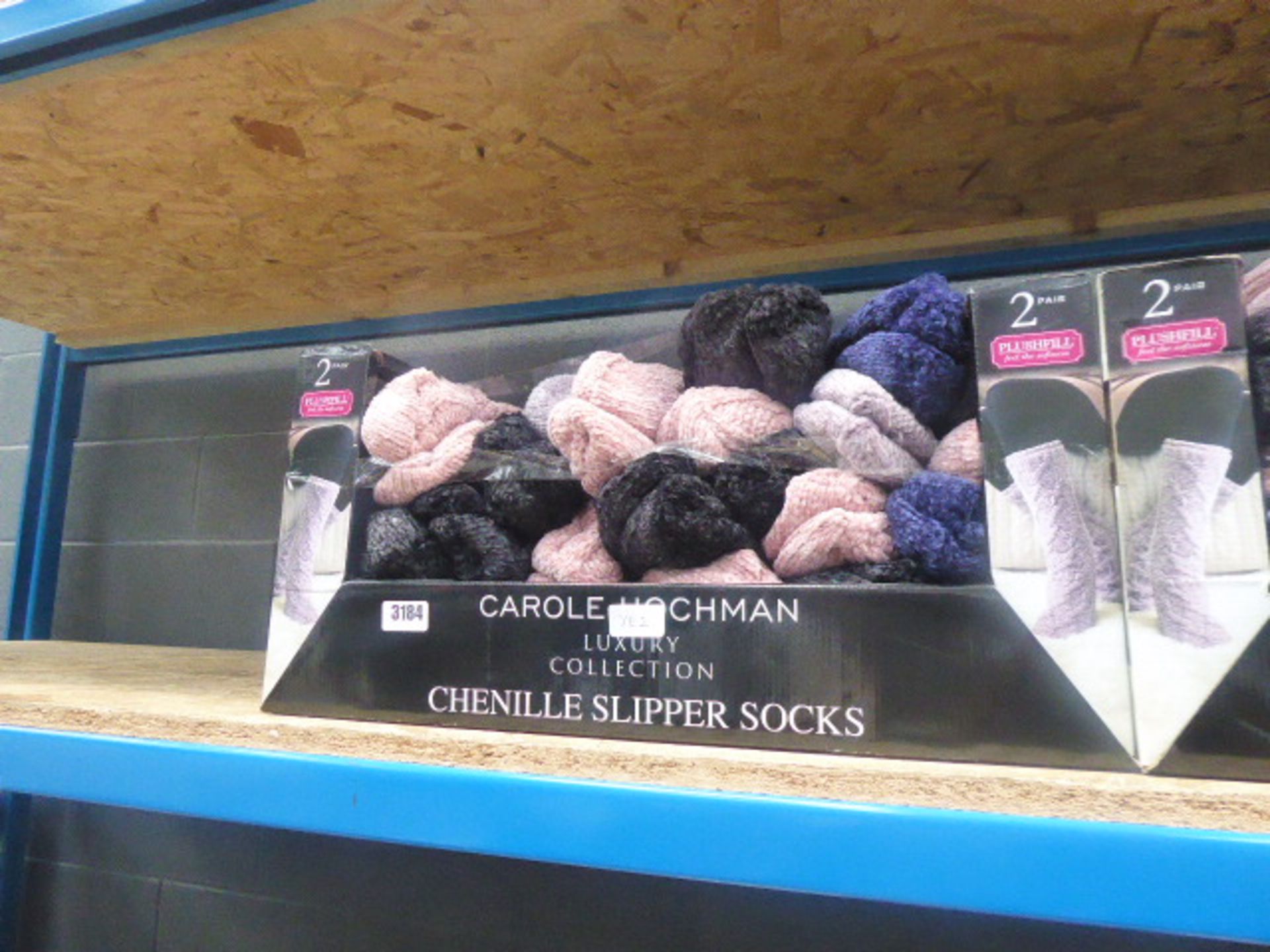 Tray of Carole Hotchman slipper socks