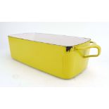 A1960/70's Quistgaard Dansk Designs IHQ yellow enamelled serving dish with cooling handles, l.