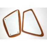 Two Danish teak mounted mirrors of abstract form CONDITION REPORT: Structurally