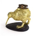 A 1950's Japanese cast metal and gilded lighter in the form of a bird,