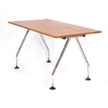 A teak and crossbanded office table, on a later Norman Foster-style chromed base,