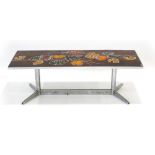 A 1970's tile topped occasional table with a chromed frame,