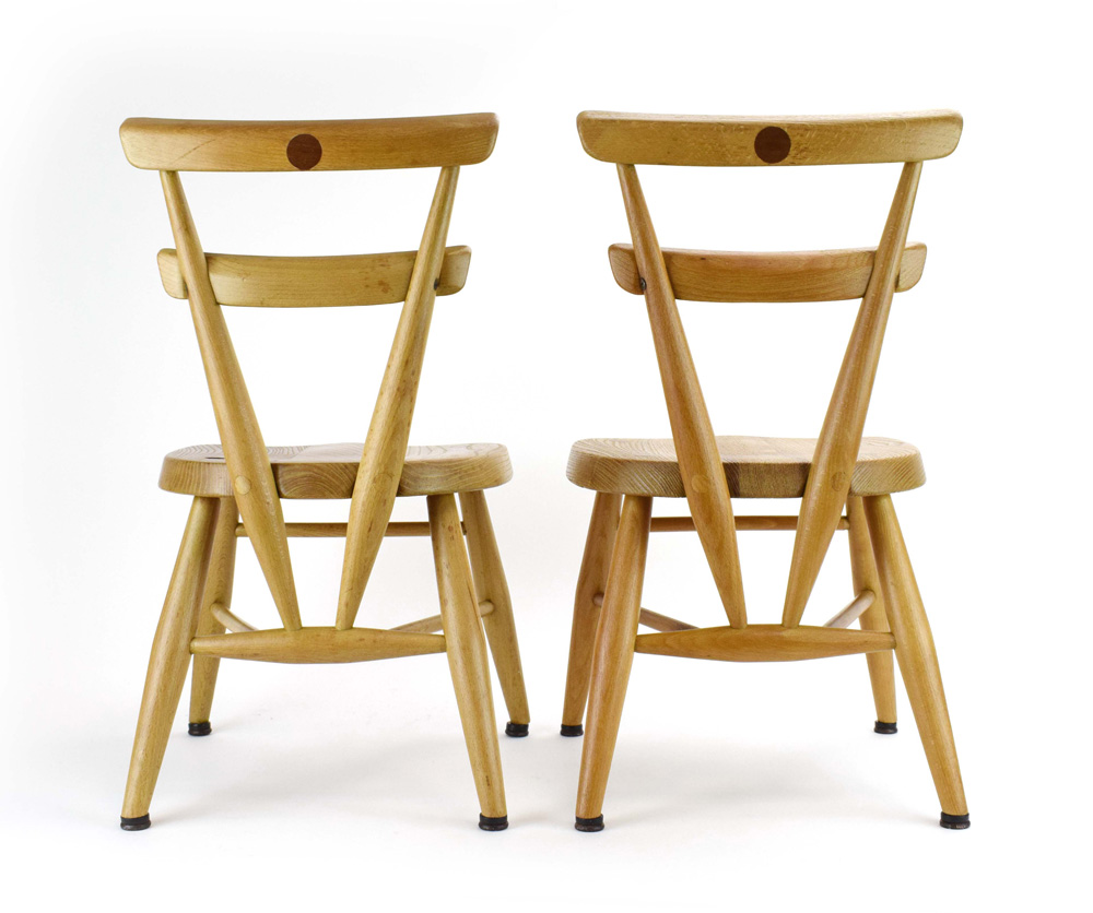 A pair of Ercol 'Red Dot' childrens stacking chairs in elm and beech, - Image 3 of 5