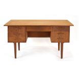 A 1960's Danish teak and crossbanded desk,