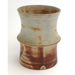 Mo Abbaro / Mohammed Abdalla (1935-2016), a studio pottery vase with a ridged centre,
