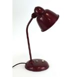 A German red enamelled adjustable desk lamp attributed to Kaiser Idell CONDITION REPORT: