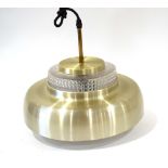 A 1970's brass coloured ceiling light with a moulded glass inner shade CONDITION REPORT: