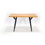 A Finnish Ilmari Tapiovaara Pirkka breakfast table, the two slabs resting on an ebonised frame,